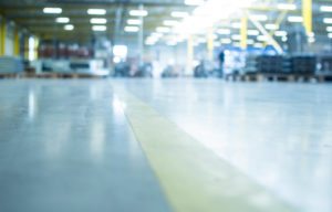 out of focus image of a factory floor